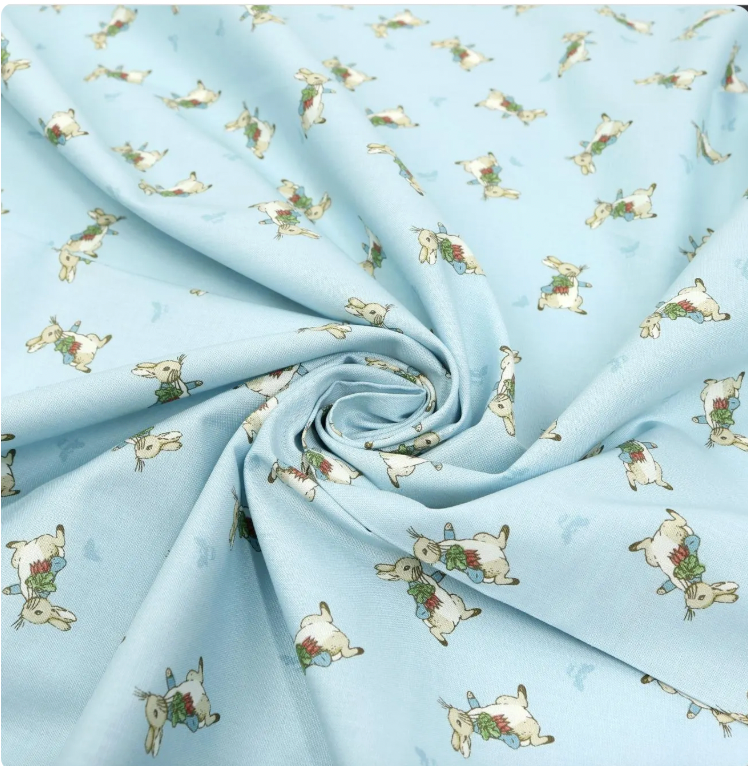 The Tale of Peter Rabbit, Peter Toss Blue, Riley Blake designs, Beatrix Potter, baby fabric, quilting weight cotton, light blue, bunny